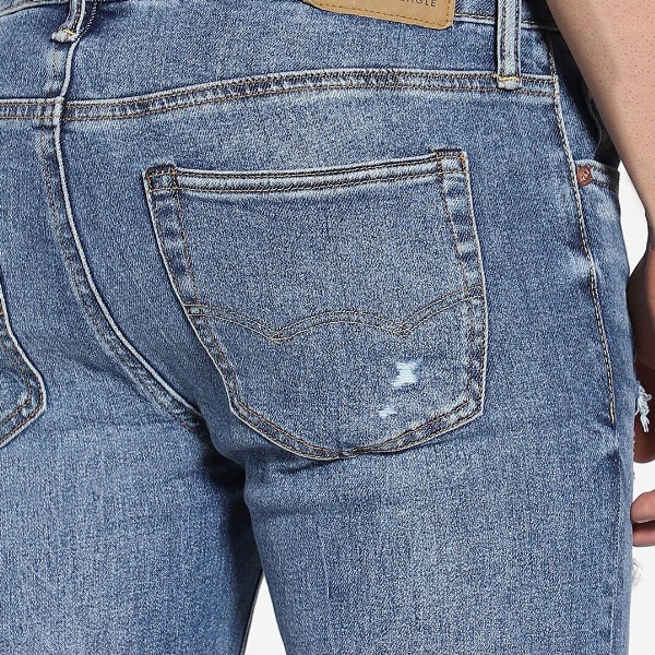 AMERICAN EAGLE OUTFITTERS Men Skinny Fit Highly Distressed Light Fade Stretchable Jeans